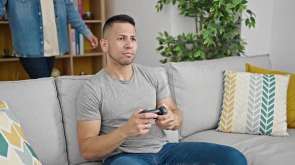 Two Men Couple Playing Video Game Hugging Each Other Home — Stock Video