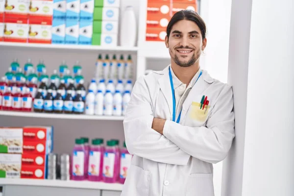 Young Hispanic Man Pharmacist Smiling Confident Standing Arms Crossed Gesture — Zdjęcie stockowe