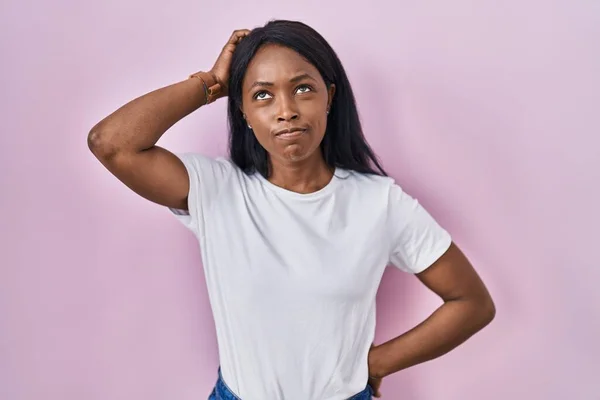 African Young Woman Wearing Casual White Shirt Confuse Wondering Question — Stock Photo, Image