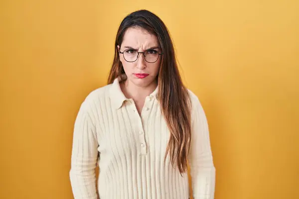 Young Hispanic Woman Standing Yellow Background Skeptic Nervous Frowning Upset — Stock Photo, Image