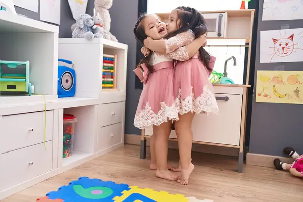 Adorable Twin Girls Playing Play Kitchen Hugging Each Other Kindergarten — Stock Photo, Image