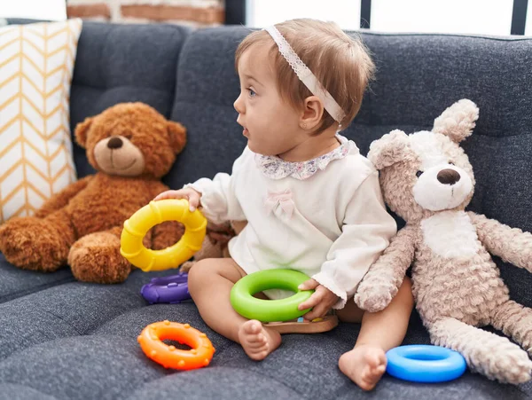 Adorable Caucasian Baby Playing Hoops Game Sitting Sofa Home — Stock Photo, Image