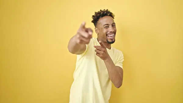 African American Man Smiling Confident Pointing Fingers Camera Isolated Yellow — Stock Photo, Image