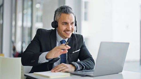 Young Hispanic Man Business Worker Having Video Call Taking Notes — Stock Photo, Image