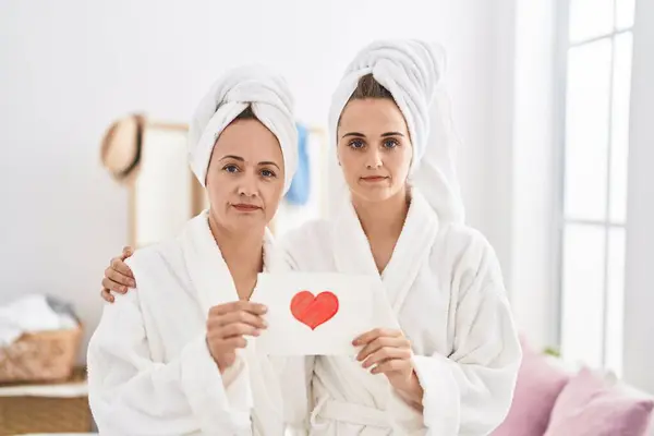 Middle Age Woman Daughter Wearing Bath Robe Holding Heart Card — Stock Photo, Image