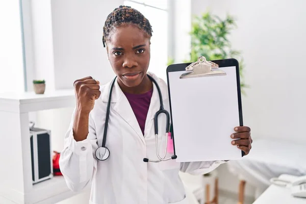 Beautiful Black Doctor Woman Holding Clipboard Annoyed Frustrated Shouting Anger — Stock Photo, Image
