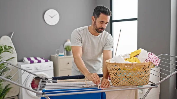Young Hispanic Man Hanging Clothes Clothesline Laundry Room — Stock Photo, Image