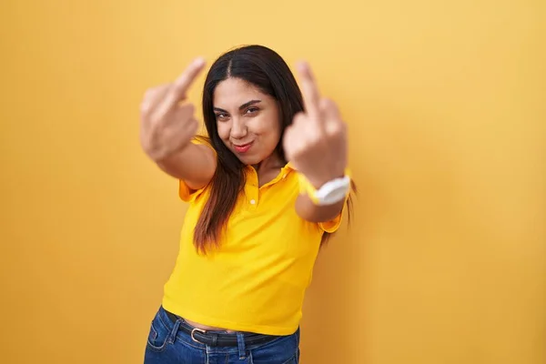 Young Arab Woman Standing Yellow Background Showing Middle Finger Doing — 스톡 사진