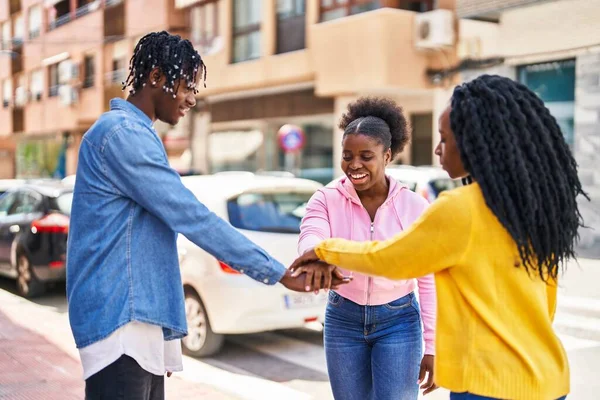 African American Friends Smiling Confident Standing Hands Together Street — Stock Photo, Image