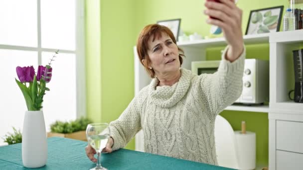 Mature Hispanic Woman Doing Video Call Sitting Table Drinking White — Stock Video