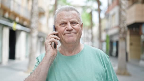 Middle Age Grey Haired Man Smiling Confident Talking Smartphone Street — Stock Video