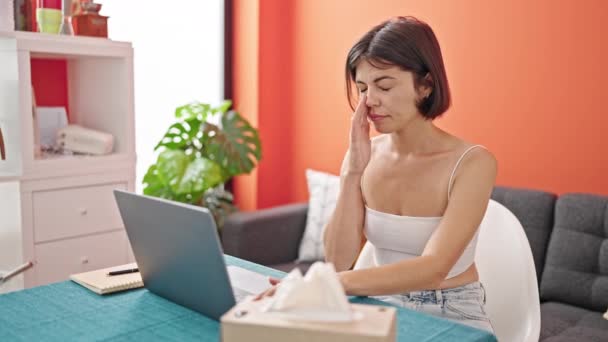 Young Beautiful Hispanic Woman Using Laptop Sneezing Dinning Room — Stock Video