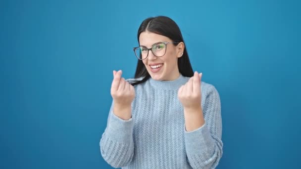 Young Hispanic Woman Smiling Confident Doing Spend Money Gesture Isolated — Stock Video
