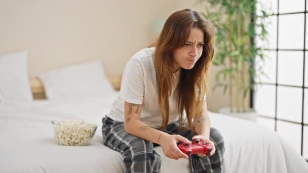 Young Beautiful Hispanic Woman Playing Video Game Sitting Bed Bedroom — Stock Video