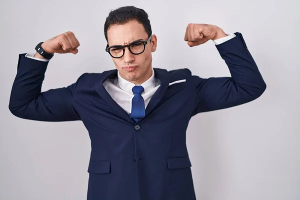 Young Hispanic Man Wearing Suit Tie Showing Arms Muscles Smiling — Stock Photo, Image