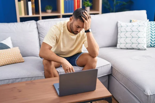 Young Hispanic Man Stressed Sitting Sofa Home — Stock Photo, Image