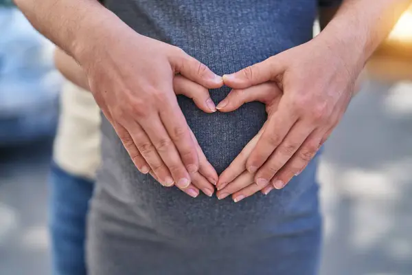 Man Woman Couple Hugging Each Other Doing Heart Gesture Belly — Stock Photo, Image