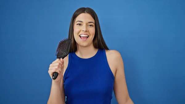 Young Beautiful Hispanic Woman Singing Song Using Brush Microphone Isolated — Stock Photo, Image