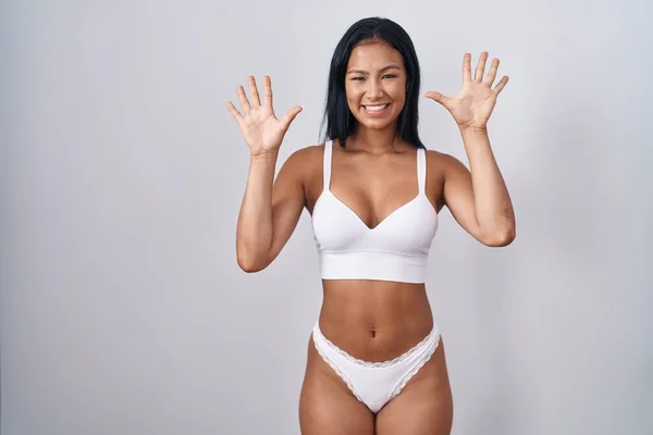 Hispanic Woman Wearing Lingerie Showing Pointing Fingers Number Ten While — Stock Photo, Image