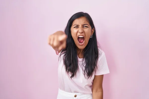 Young Hispanic Woman Standing Pink Background Pointing Displeased Frustrated Camera — Stock Photo, Image