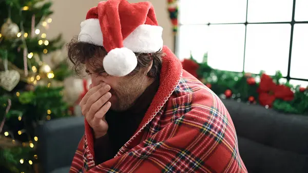 Young Hispanic Man Feeling Cold Covered Blanket Sitting Sofa Christmas — Stock Photo, Image