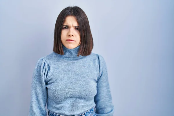 Young Hispanic Woman Standing Blue Background Skeptic Nervous Frowning Upset — Stock Photo, Image