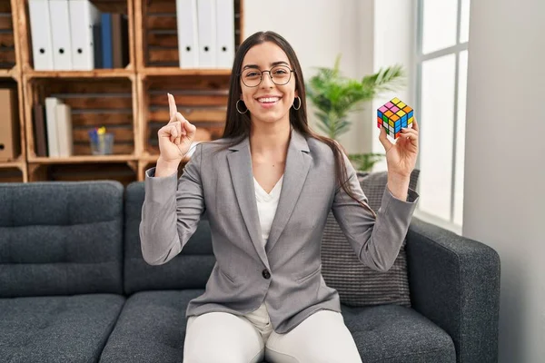 Hispanic Woman Playing Colorful Puzzle Cube Intelligence Game Surprised Idea —  Fotos de Stock