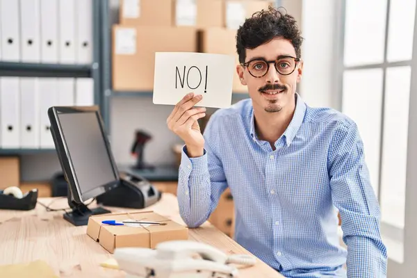 Hispanic Man Working Small Business Ecommerce Holding Banner Looking Positive — Stock Photo, Image