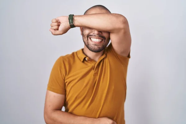 Hispanic Man Beard Standing White Background Covering Eyes Arm Smiling — Stock Photo, Image