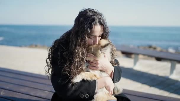 Young Hispanic Woman Dog Smiling Confident Sitting Bench Kissing Seaside — Stock Video