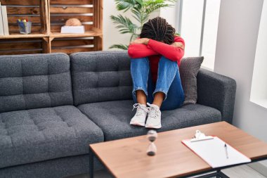African american woman stressed patient having psychology session at psychology center
