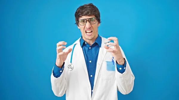 Young Hispanic Man Doctor Angry Stressed Isolated Blue Background — Stock Photo, Image