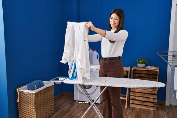 Young Beautiful Hispanic Woman Holding Clothes Ironing Clothes Laundry Room — Stock Photo, Image