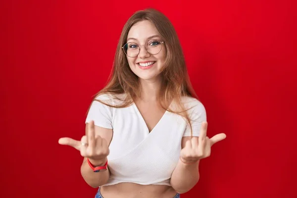 Young Caucasian Woman Standing Red Background Showing Middle Finger Doing — Stok Foto