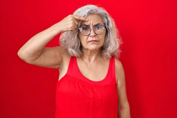 Middle Age Woman Grey Hair Standing Red Background Pointing Unhappy — Stock Photo, Image