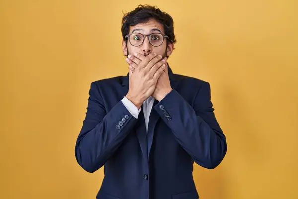 Handsome Latin Man Standing Yellow Background Shocked Covering Mouth Hands — Stock Photo, Image
