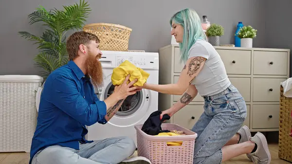 Man Woman Couple Smiling Confident Washing Clothes Laundry Room — Foto Stock