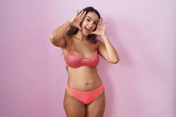 Young Hispanic Woman Wearing Lingerie Pink Background Smiling Cheerful Playing — Stock fotografie