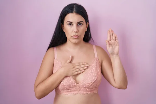Young Hispanic Woman Wearing Pink Bra Swearing Hand Chest Open — Stock Photo, Image