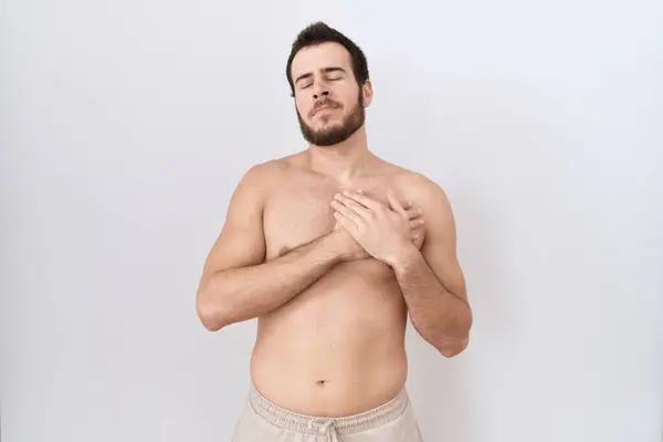 Young Hispanic Man Standing Shirtless White Background Smiling Hands Chest — Stock Photo, Image