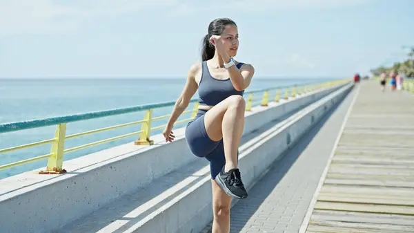 Young Beautiful Hispanic Woman Wearing Sportswear Training Seaside — Stock Photo, Image