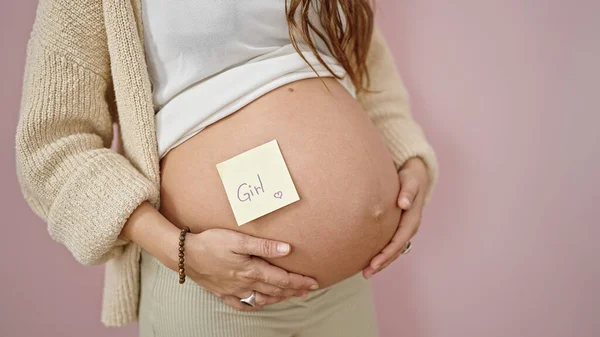 Mladá Těhotná Žena Masírování Břicho Dívkou Připomínat Papír Přes Izolované — Stock fotografie