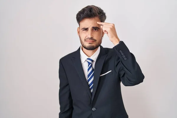 Young Hispanic Man Tattoos Wearing Business Suit Tie Pointing Unhappy — Stock Photo, Image