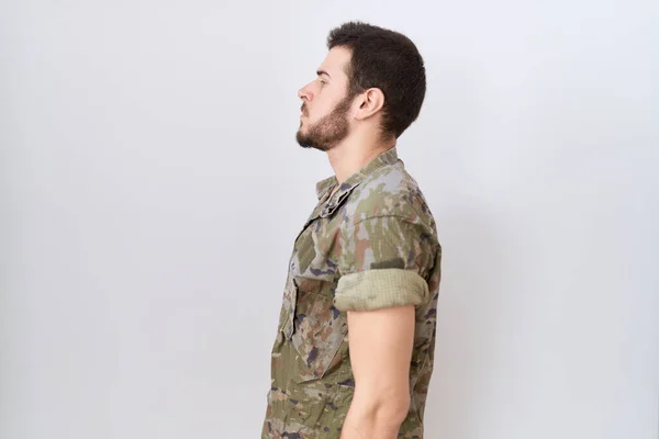 Young Hispanic Man Wearing Camouflage Army Uniform Looking Side Relax — Stockfoto