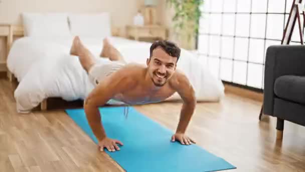 Young Hispanic Man Training Push Smiling Bedroom — Stock Video