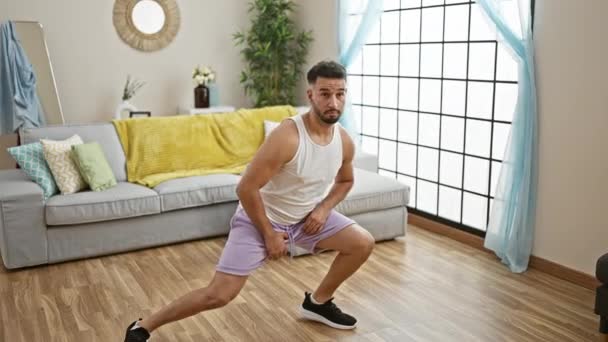 Young Arab Man Training Legs Exercise Home — Stock Video