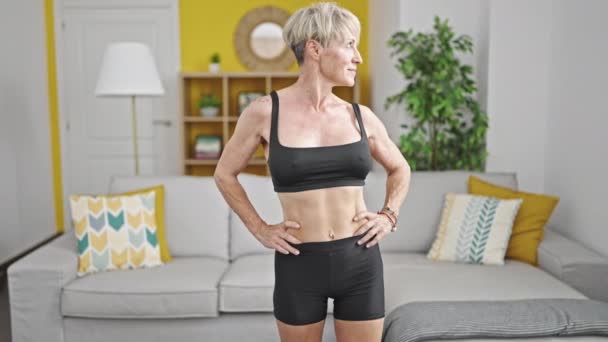 Middle Age Blonde Woman Wearing Sportswear Smiling Confident Home — Stock Video