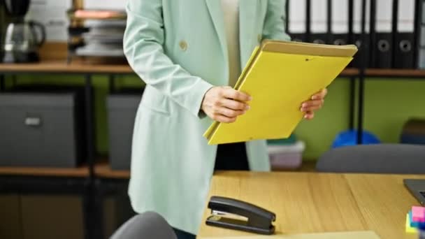 Young Blonde Woman Business Worker Smiling Confident Holding Binder Office — Stock Video