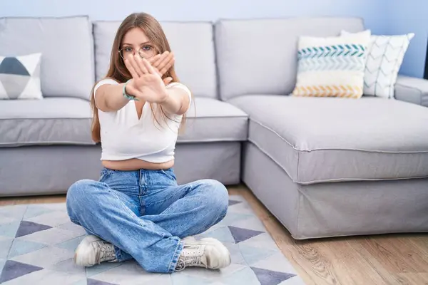 Young Caucasian Woman Sitting Floor Living Room Rejection Expression Crossing — Stock Photo, Image