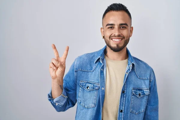 Young Hispanic Man Standing Isolated Background Smiling Happy Face Winking — Stock Photo, Image